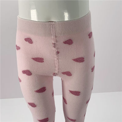 Comfortabele baby meisjes stropdassen in ademend katoen met roze harten